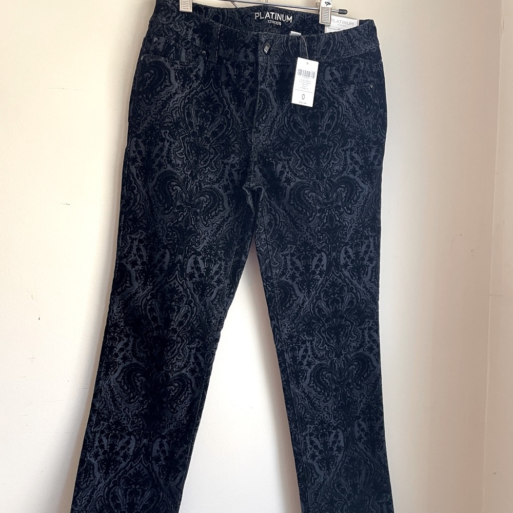 Chicos Platinum black jean/pant with velvet design. Slim leg an slims all over.